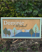 Trees and Mountain Sunset SignThis adorable wood nursery sign would be a perfect addition to any little one’s room. 

This personalized sign is solid wood. 
3 sizes available -
12”x24 - Small
16xMountain Sunset Sign