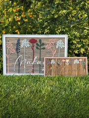 Floral Stem Nursery BoardThis adorable wood nursery sign would be a perfect addition to any little one’s room. 

This personalized sign is solid wood. 
3 sizes available -
12”x24 - Small
16xFloral Stem Nursery Board