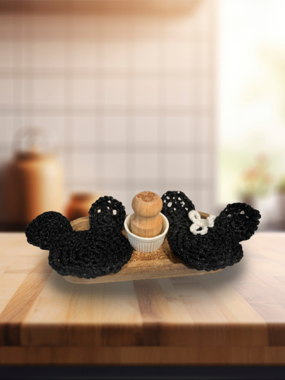 Mickey Scrubbies with Wood TrayIntroducing our exquisite mango wood tray with a wood dish brush and two adorable Mickey-shaped scrubby sponges! This charming set is perfect for adding a touch of DMickey Scrubbies