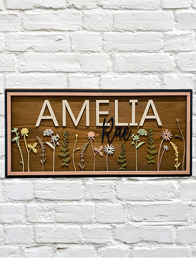 Wildflower Nursery SignThis adorable wood nursery sign would be a perfect addition to any little one’s room. 

This personalized sign is solid wood. 
3 sizes available -
12”x24 - Small
16xWildflower Nursery Sign