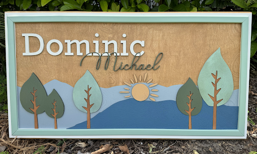 Trees and Mountain Sunset SignThis adorable wood nursery sign would be a perfect addition to any little one’s room. 

This personalized sign is solid wood. 
3 sizes available -
12”x24 - Small
16xMountain Sunset Sign