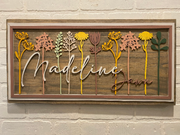 Floral Stem Nursery BoardThis adorable wood nursery sign would be a perfect addition to any little one’s room. 

This personalized sign is solid wood. 
3 sizes available -
12”x24 - Small
16xFloral Stem Nursery Board