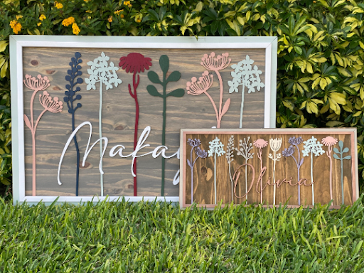 Floral Stem Nursery BoardThis adorable wood nursery sign would be a perfect addition to any little one’s room. 

This personalized sign is solid wood. 
3 sizes available -
12”x24 - Small
16xFloral Stem Nursery Board