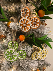 Mickey Citrus DecorAdd a little Disney ZEST to your tree or gift package with these cute citrus ornaments. 

Ornaments are made to order. 
Made from 2 layers of Birch. Ornament measureMickey Citrus Decor