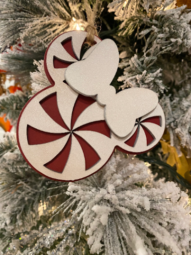 Mickey Peppermint OrnamentAdd a little Disney Magic to your tree or gift package with this cute peppermint ornament. 

Ornaments are made to order. 
Made from 2 layers of Birch. Ornament measMickey Peppermint Ornament