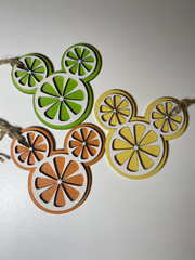 Mickey Citrus DecorAdd a little Disney ZEST to your tree or gift package with these cute citrus ornaments. 

Ornaments are made to order. 
Made from 2 layers of Birch. Ornament measureMickey Citrus Decor