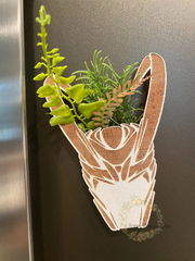 Marvel Mini PlanterNot just a magnet to add to your refrigerator… its a mini plant too… well a faux plant. Adds a pop of color to your refrigerator or even your office area. 
Great gifMarvel Mini Planter